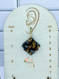 Metallic Dangles