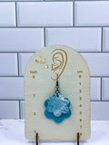 Teal Embossed Flowers